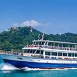 Original illustration of a passenger ferry crossing turquoise Thai island waters