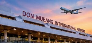 Original conceptual illustration of Don Mueang airport at sunset with an arriving aircraft