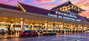 Illustrated airport frontage in northern Thailand at dusk