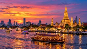 Original Bangkok-inspired illustration of temple spires, boats and the river at sunset.